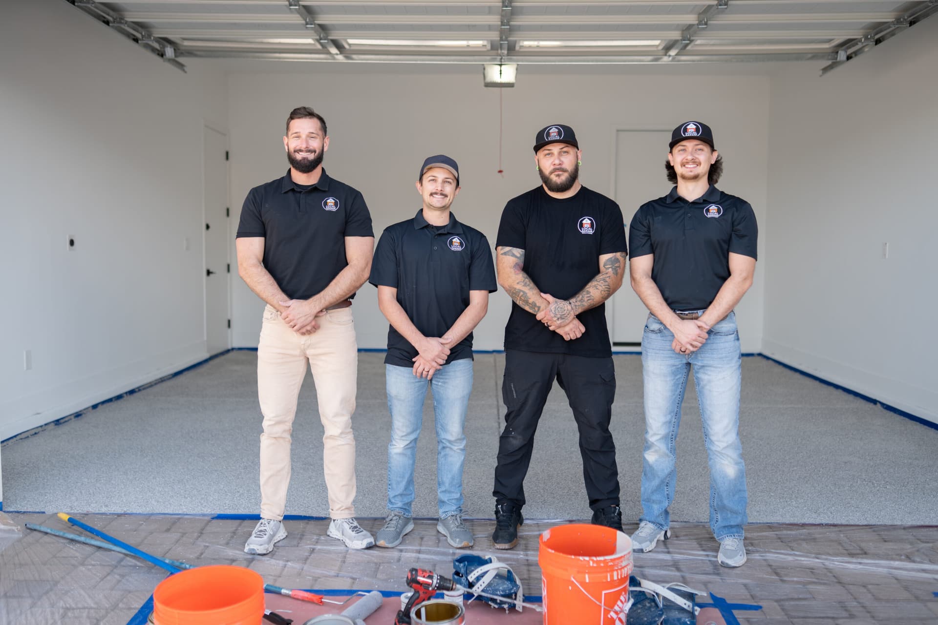 The Local Garage Solutions team inside a finished Arizona garage
